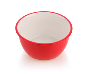 red ceramic bowl with a white interior. isolated on a white background