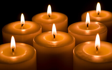 Seven Lit Candles in Dark