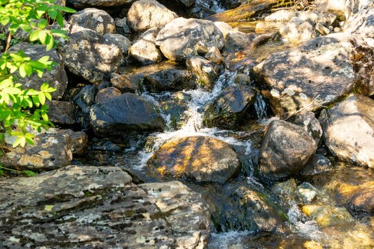 The flow of a mountain river among rocks.  Ergaki Nature Park