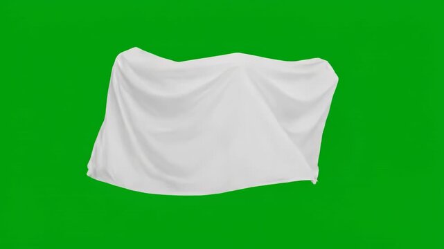 A sheet-covered object floating and making a slow turn on green screen visual, floating, halloween