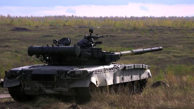 t-80 main battle tank stationary in open field