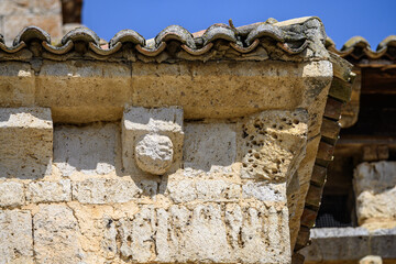 Detail of sculpted corbels under the eaves of the Church of San Cornelio and San Cipriano in San Cebrian de Campos © Agustin