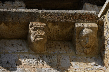Detail of sculpted corbels under the eaves of the Church of San Cornelio and San Cipriano in San Cebrian de Campos © Agustin