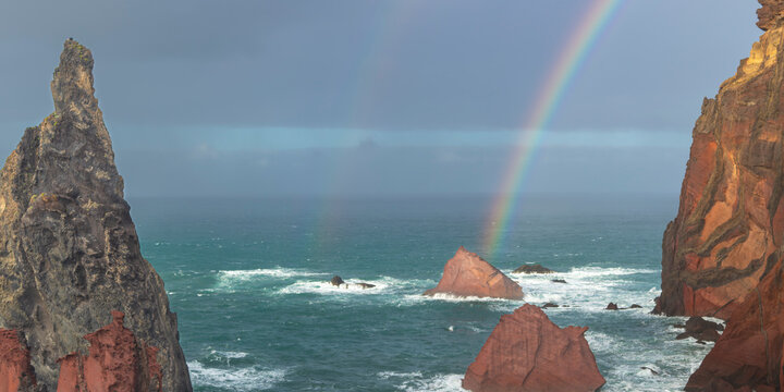 Rainbow over volcanic cliffs at sunset on Ponta de S�o Louren�o Madeira