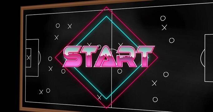 Displaying framed tactical board showing neon START wordmark and X O markers on soccer pitch