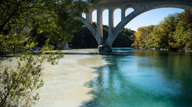 Viaduc de La Jonction merges the rivers Rh&ocirc;ne and Arve in Geneva,Switzerland creating a visible split
