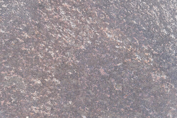 落ち着いた色合いの石の断面と微細な砂粒が美しい岩肌のテクスチャ背景