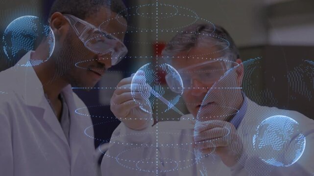 Sr tech starting pipetting while Jr tech holding slide for lab test with dotted-globe rotating