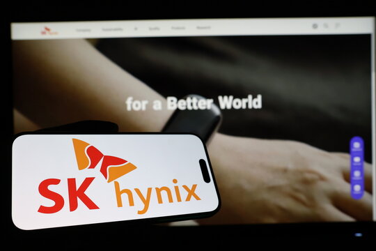 Kiel, Germany - 03-12-2026: Smartphone displaying South Korean semiconductor company SK Hynix logo in front of companys webpage