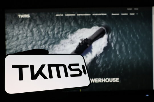Kiel, Germany - 03-12-2026: Smartphone displaying German naval shipbuilding company TKMS logo in front of companys webpage