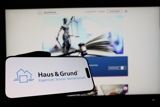 Kiel, Germany - 03-12-2026: Smartphone displaying Haus und Grund logo in front of companys webpage