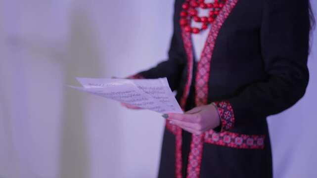 Woman reading notes on white background