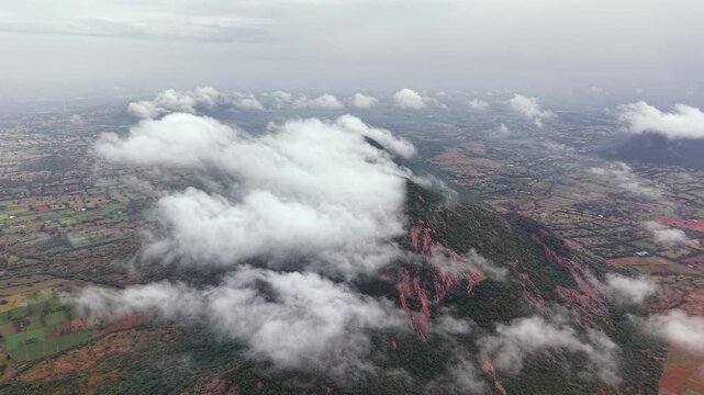 Aerial View of Kondarangi Hills with Rocky Peak and Clouds in Dindigul Tamil Nadu