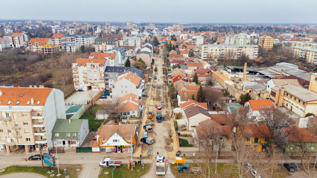 Aerial view of a bustling street under construction, blending the old with the new amidst a tapestry of urban life, Belgrade, City of Belgrade, Serbia.
