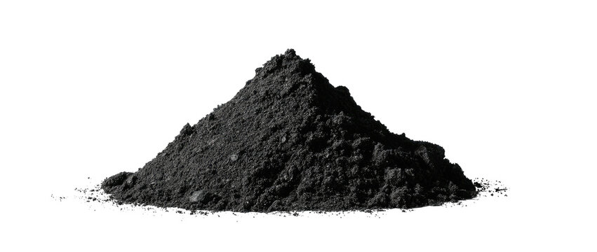 A close-up shot of a dark gray or black pile of granular material, set against a black background