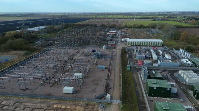 High-altitude aerial shot of the Walpole Substation complex, illustrating the scale of high-voltage connectivity near the East Anglian coast.