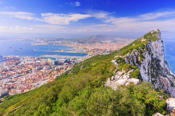 Gibraltar Rock, Gibraltar. View from above, on the left Gibraltar town and bay, La Linea town in Spain at the far end.