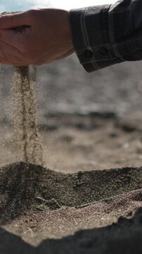 Hands Sand Beach Erosion Time Passing Concept on Sunny Day Outdoors