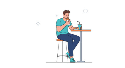 Fototapeta premium Casual man sitting at a bar table is eating a large hot dog and drinking a soda while taking a break in a cafe.