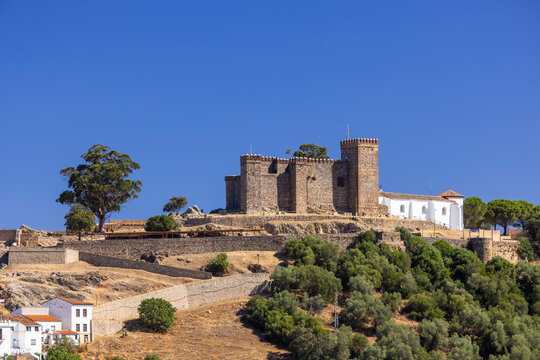 Cortegana castle and church on hill in Huelva, Spain