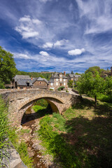 Fototapeta premium Sebrazac village stone bridge crossing stream