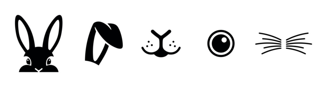 Black rabbit face elements icon set includes a head, floppy ear, nose, eye, and whiskers for creating a cute animal character or a festive holiday design concept
