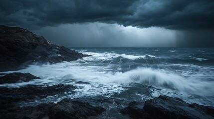 Obraz premium Dramatic seascape with dark clouds and waves crashing against rocks