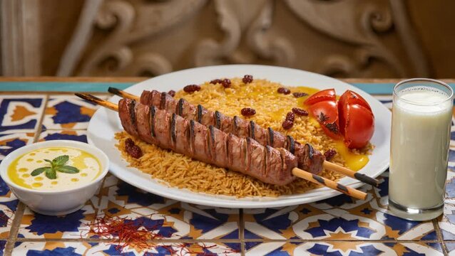 Classic Tehran Chelo Kebab with Grilled Tomato and Doogh