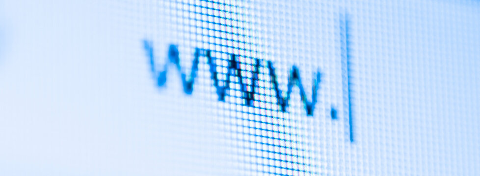 Macro photography of a screen showing the "www." prefix in a browser address bar, concept for internet browsing, web design, and digital connectivity