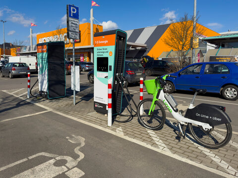Berlin, Germany - March 11, 2026: Charging station for electric vehicles at the parking lot of a DIY store.