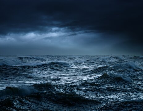 dark stormy ocean surface with choppy waves and murky water creating a dramatic seascape at night