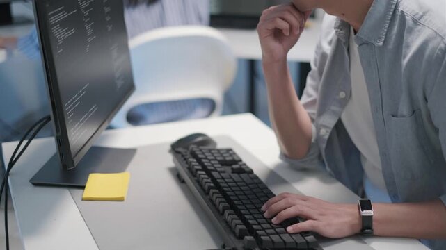 Close-up hand typing keyboard software engineer coding developer web application database service tech team IT support working online at home freelance indoor office, business technology concept