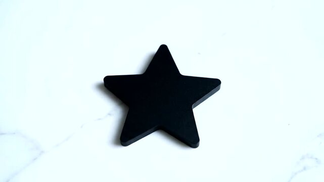 Black star shape on white background.