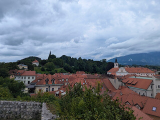 Scenic panoramic view of the town of Kamnik with the old castle on the hill in Slovenia