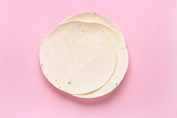 Fresh thin lavash on pink background