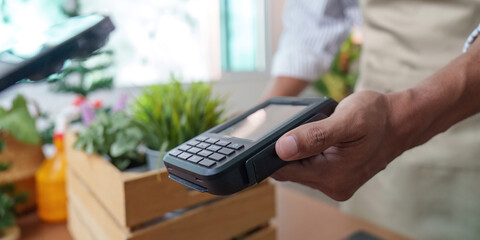 Sustainability in Action: Eco-friendly payment processing in a plant shop