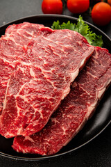 Fototapeta premium Raw beef steak marbled meat veal tasty snack fresh delicious gourmet food background on the table rustic food top view copy space