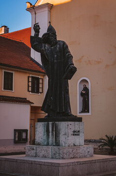 Statue of Grgur Ninski located in the city of Varaždin, Croatia. The historic sculpture is an important cultural landmark in the old town, representing the legacy of the medieval Croatian bishop.