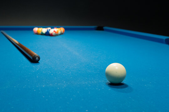 pool balls on a blue background