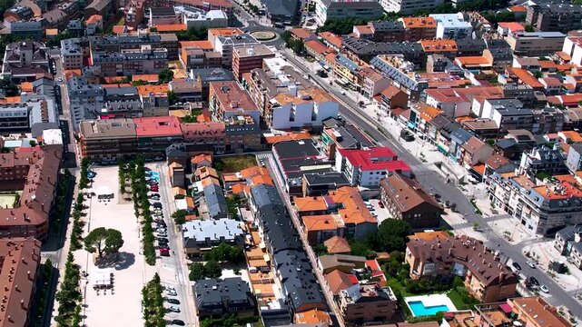 Aerial panorama view around the downtown of the city Collado Villalba  in Spain on a sunny summer noon.