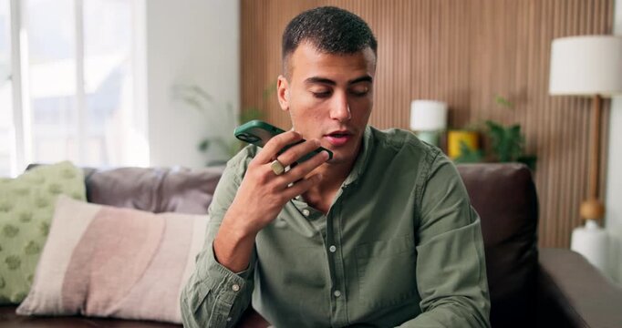 Phone, recording and thinking with man on sofa in living room of home for audio reminder. App, talking an voice note with thoughtful person in apartment for mobile memo of schedule or to do list