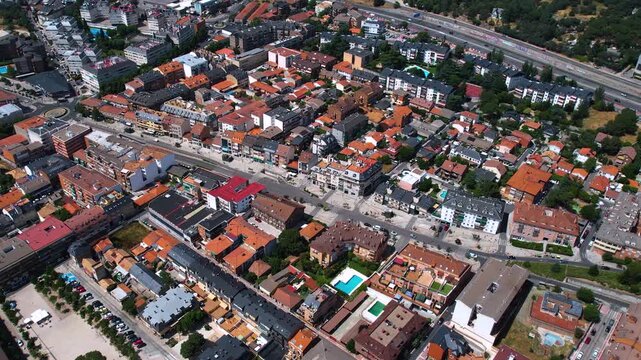 Aerial panorama view around the downtown of the city Collado Villalba  in Spain on a sunny summer noon.