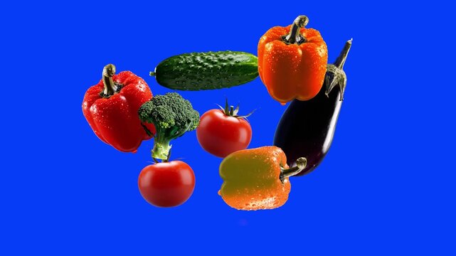 A vibrant mix of tomatoes, peppers, cucumber, broccoli, and eggplant floating and rotating in mid-air against a solid blue backdrop. This dynamic 3D composition is perfect for healthy lifestyle promos