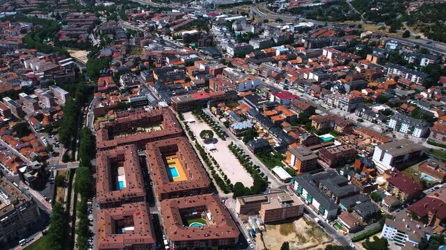 Aerial panorama view around the downtown of the city Collado Villalba  in Spain on a sunny summer noon.