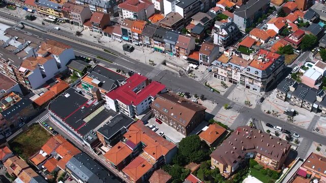 Aerial panorama view around the downtown of the city Collado Villalba  in Spain on a sunny summer noon.