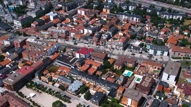 Aerial panorama view around the downtown of the city Collado Villalba  in Spain on a sunny summer noon.
