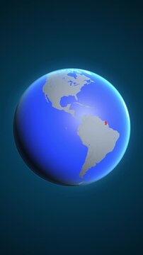 The animation shows a graphic representation of the earth and highlights the location and map of French Guiana colored red in vertical format.