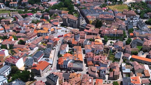 Aerial panorama view around the downtown of the city El Espinar  in Spain on a sunny summer noon.
