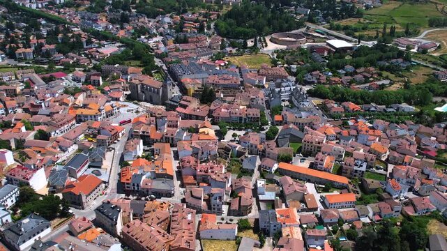 Aerial panorama view around the downtown of the city El Espinar  in Spain on a sunny summer noon.