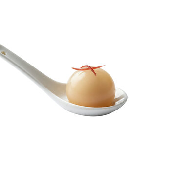 Molecular gastronomy spherification on ceramic spoon